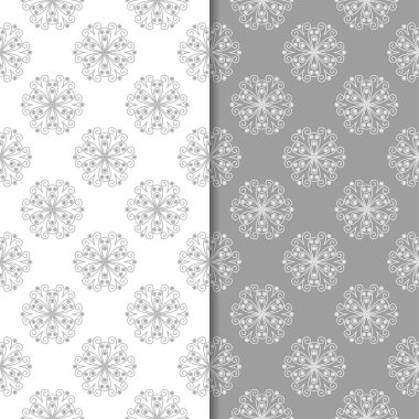 Beyaz ve gri çiçek süs tasarımlar. Tekstil ve duvar kağıtları için dikişsiz desen seti
