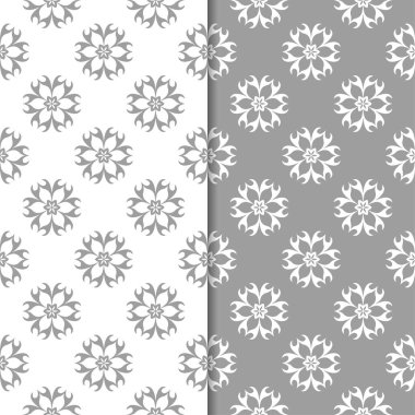 Beyaz ve gri arka plan çiçek kümesi. Tekstil ve duvar kağıtları için dikişsiz desen