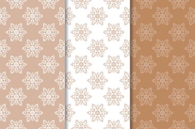 Kahverengi ve bej çiçek arka planlar kümesi. Tekstil ve duvar kağıtları için dikişsiz desen seti