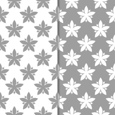 Beyaz ve gri çiçek arka planlar. Tekstil ve duvar kağıtları için dikişsiz desen seti