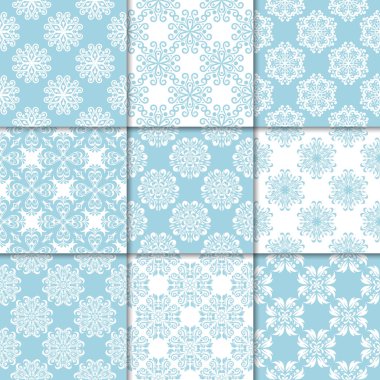 Mavi ve beyaz çiçekli süsler. Kağıt için dikişsiz desen koleksiyonu Tekstil