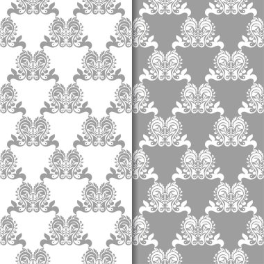 Beyaz ve gri çiçek arka planlar. Tekstil ve duvar kağıtları için dikişsiz desen seti