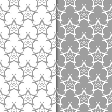 Beyaz ve gri çiçek arka planlar. Tekstil ve duvar kağıtları için dikişsiz desen seti