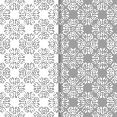 Beyaz ve gri arka plan çiçek kümesi. Tekstil ve duvar kağıtları için dikişsiz desen