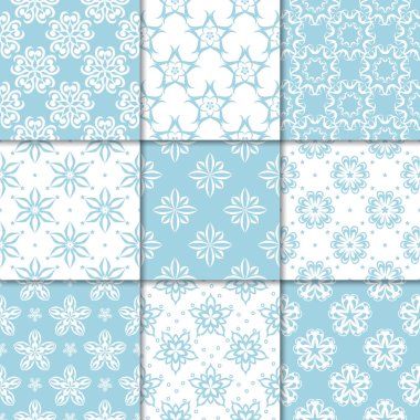 Mavi ve beyaz çiçekli süsler. Kağıt için dikişsiz desen koleksiyonu Tekstil