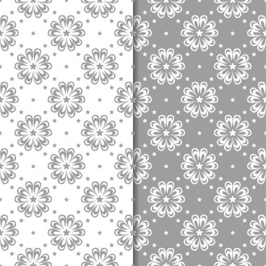 Beyaz ve gri çiçek süs tasarımlar. Tekstil ve duvar kağıtları için dikişsiz desen seti
