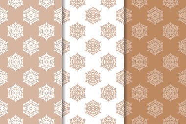 Kahverengi ve bej çiçek arka planlar kümesi. Tekstil ve duvar kağıtları için dikişsiz desen seti