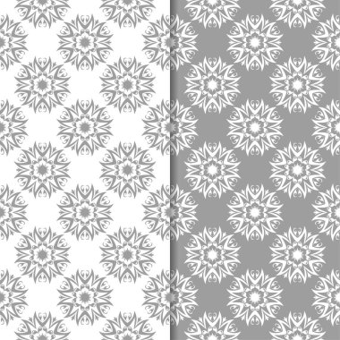 Beyaz ve gri çiçek arka planlar. Tekstil ve duvar kağıtları için dikişsiz desen seti