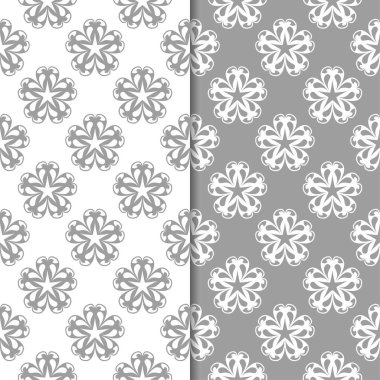 Beyaz ve gri çiçek arka planlar. Tekstil ve duvar kağıtları için dikişsiz desen seti