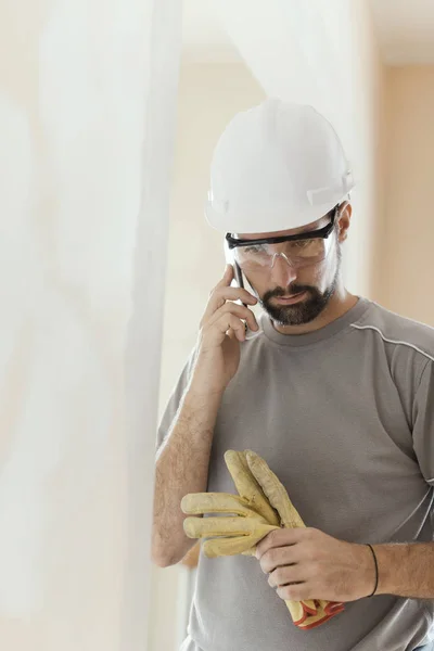 Professional Builder Safety Helmet Having Phone Call Home Renovation Communication — Stock Photo, Image