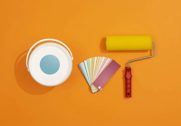 Professional painter work tools on orange background — Stock Photo, Image