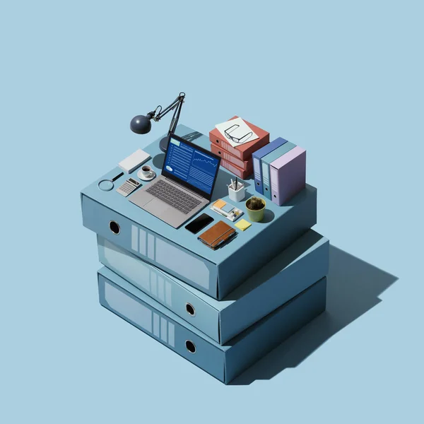 Miniature isometric office on a pile of folders