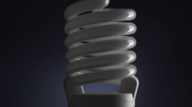 Enerji tasarruflu lamba koyu arka planda açıp kapama