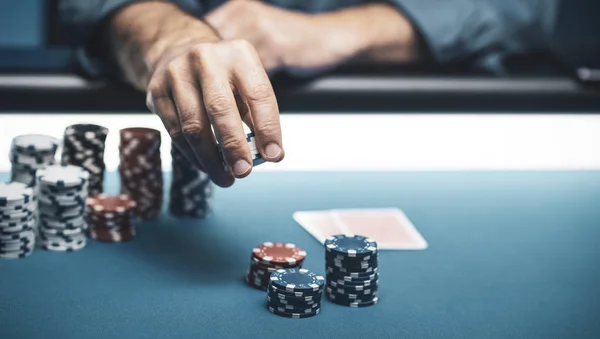 Successful player betting chips at casino — Stock Photo, Image