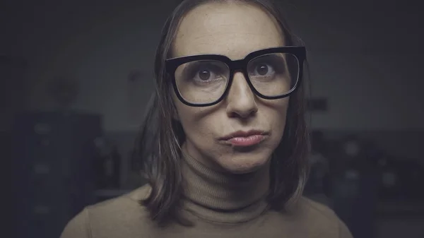 Disappointed woman staring at camera — Stock Photo, Image