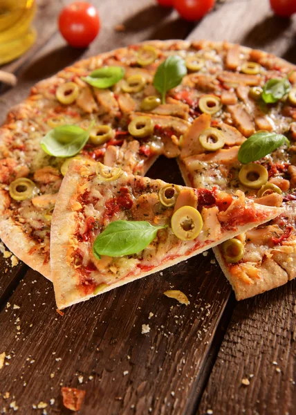 Homemade pizza with green olives — Stock Photo, Image