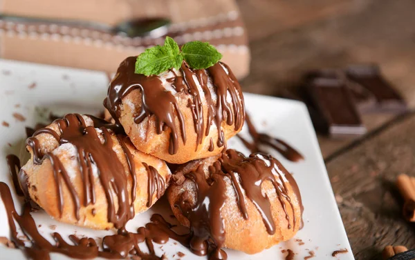 Delicious profiteroles dessert — Stock Photo, Image
