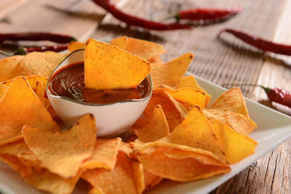 Nachos with hot pepper dip — Stock Photo, Image