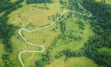 beautiful aerial landscape with curvy road clipart