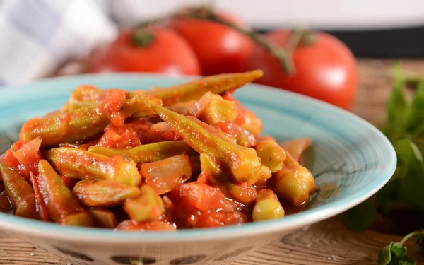 Delicious okra dish with tomatoes. Traditional greek, romanian, bulgarian and turkish dish