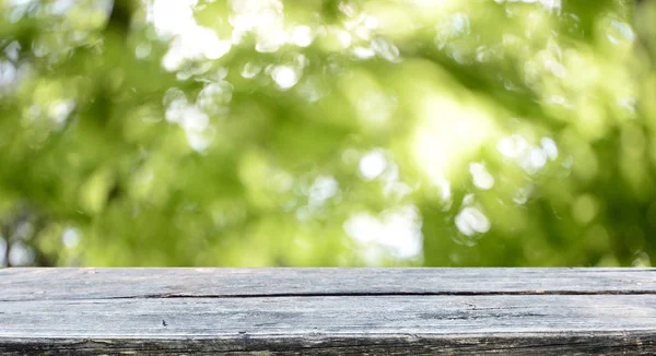 Prázdnou Dřevěný Stůl Rozmazané Pozadí Přírodní — Stock fotografie