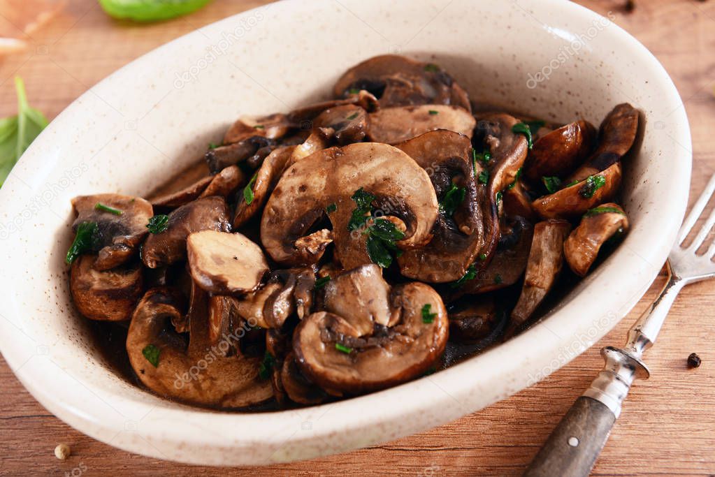Delicious mushrooms fried with butter and herbs