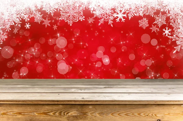 雪の結晶クリスマス背景に空の木製テーブル — ストック写真
