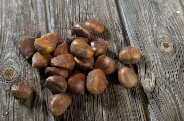 Close Van Kastanjes Houten Achtergrond — Stockfoto