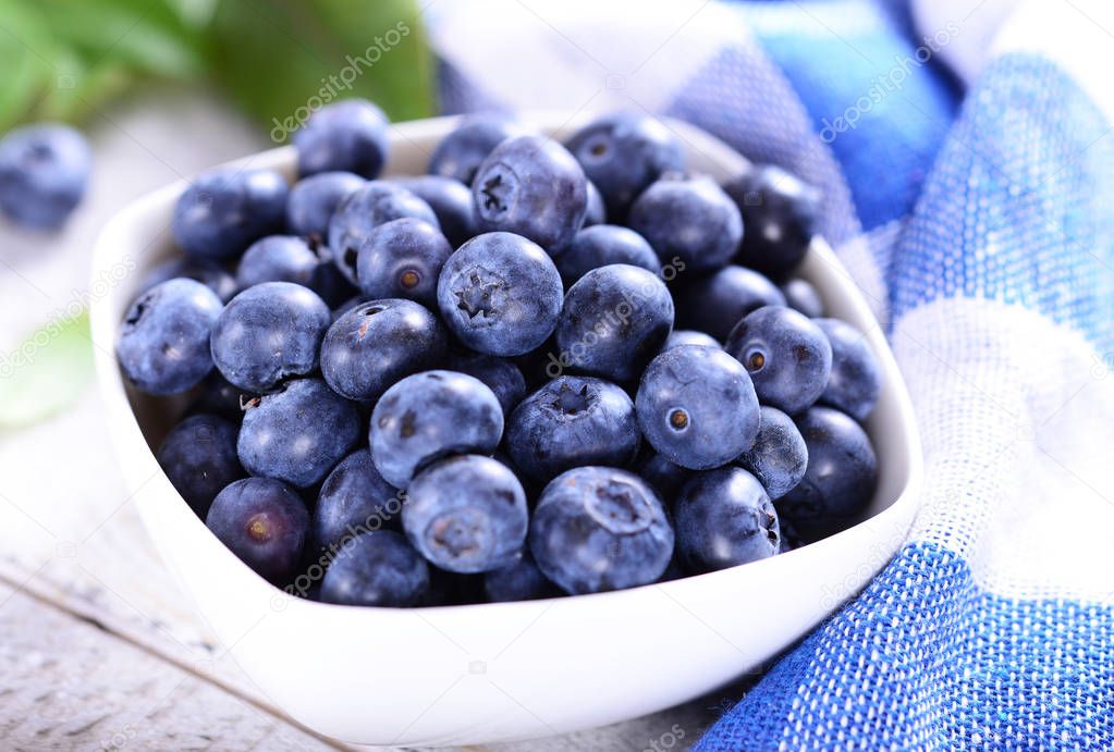 Freshly picked ripe blueberries in bowl