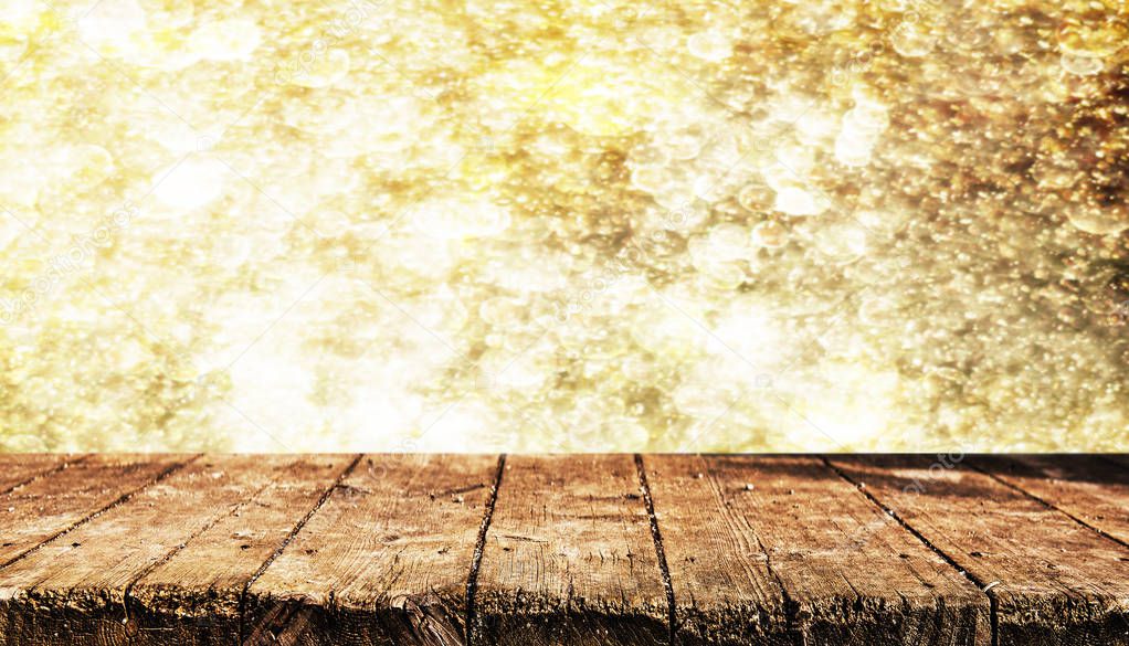 Empty wooden table with blurred natrural background