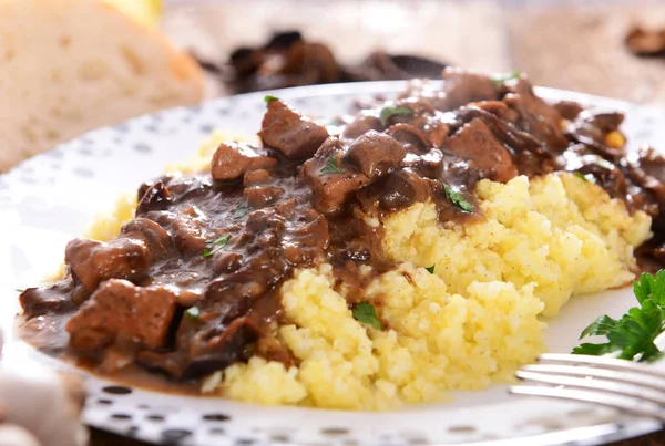 Stew with meat, mushrooms and vegetables served with groat — Stock Image Stew Meat Mushrooms Vegetables Served Groat Stock Image