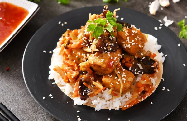 Oriental dish - rice with vegetables and chicken