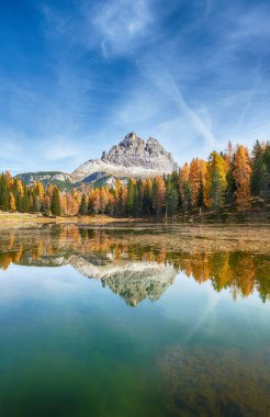 Autumn in italian dolomites - lago antorno clipart