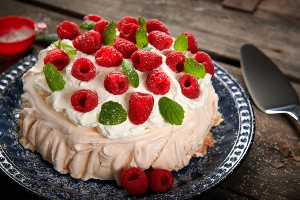Merigue cake also called pavlova cake with fruits