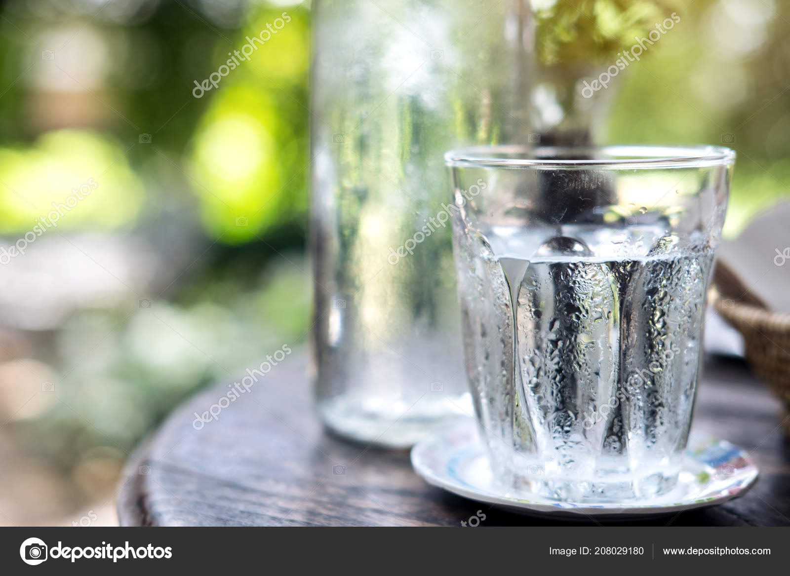 Glass Water Wooden Table Blur Nature Background Photo by ©farknot 208029180
