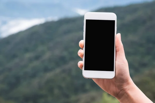 Imagen Burlona Una Mano Sosteniendo Mostrando Teléfono Inteligente Blanco Con — Foto de Stock