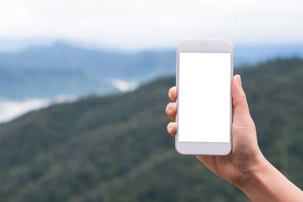 Mockup Image Hand Holding Showing White Smart Phone Blank Desktop — Stock Photo, Image