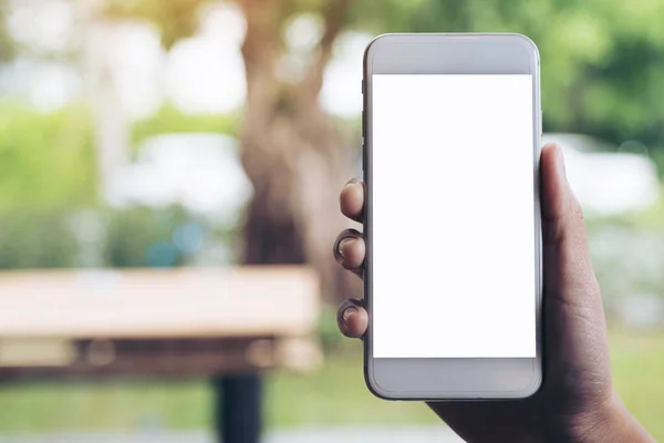 Imagen Burlona Una Mano Sosteniendo Teléfono Móvil Blanco Con Pantalla —  Fotos de Stock