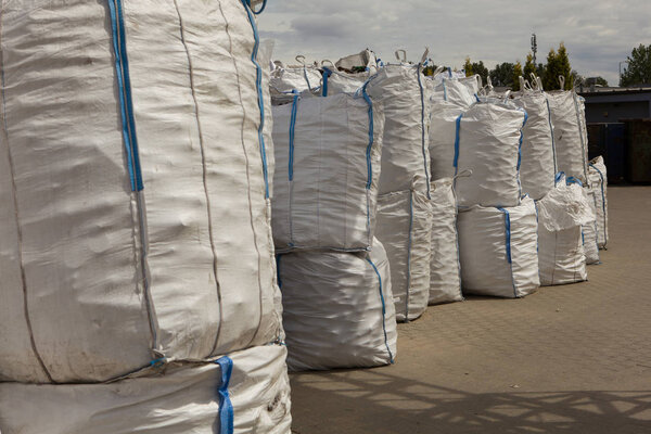 Landfill, large sacks. Recycling of bottles, large bags.