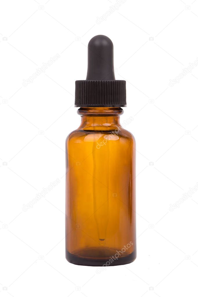 Brown Eye Dropper Bottle. Brown bottles, medicine - isolated.