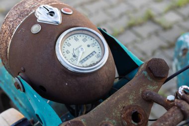 Wroclaw, Poland - August 28 2025: Rusted Soviet motorcycle speedometer close-up