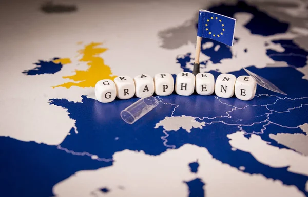 EU flag and graphene word over a map of europe — Stock Photo, Image