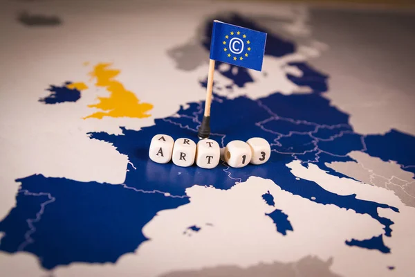 Flag with Copyright symbol over a EU map. Symbolizing the EU Directive on Copyright in the Digital Single Market or CDSM. Art. 13 is known as meme ban