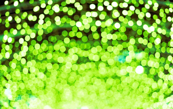 Green beautiful blurred bokeh background with copy space. Glitter yellow light spots defocused — Stock Photo, Image