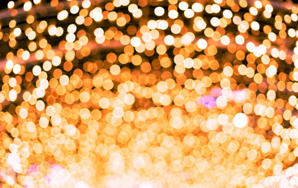 Oranje mooie wazig bokeh achtergrond met kopie ruimte. Glitter geel licht vlekken intreepupil — Stockfoto
