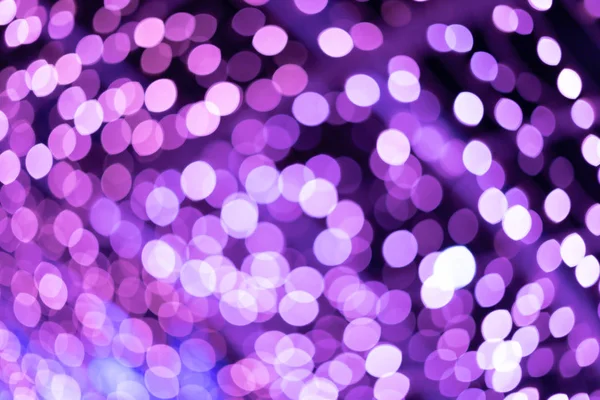 Paarse mooie wazig bokeh achtergrond met kopie ruimte. Glitter geel licht vlekken intreepupil — Stockfoto