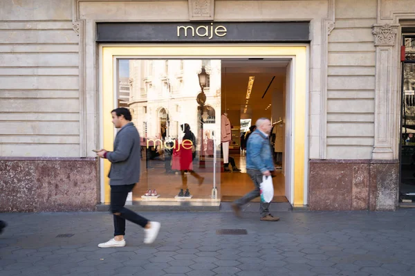 Barcelona, Spain. February 2019: People walking in front of maje store — Stock Photo, Image