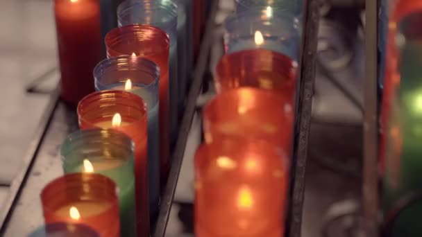 Many burning candles inside a church with — Stock Video