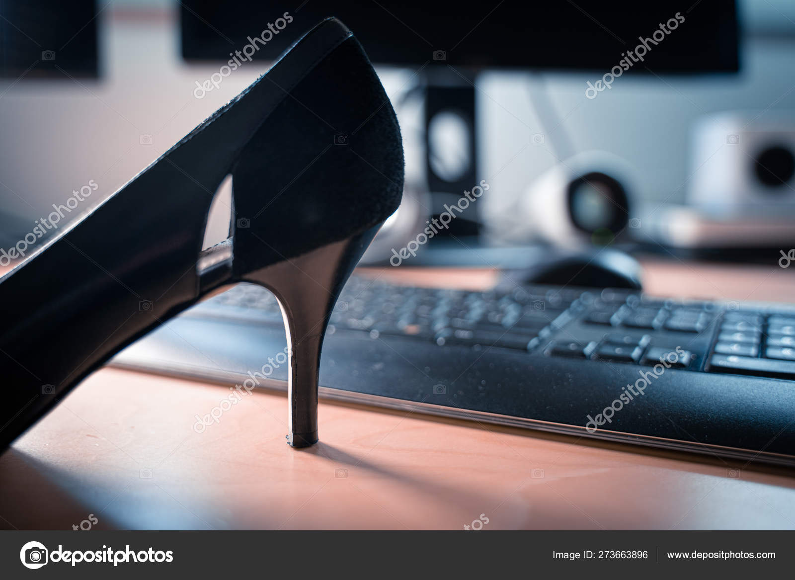 High heels on an office desk at — Stock Photo © tbtb