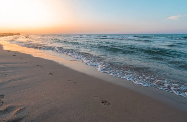 Sunset on the beach, viwe of the mediterranean sea — Stock Photo, Image